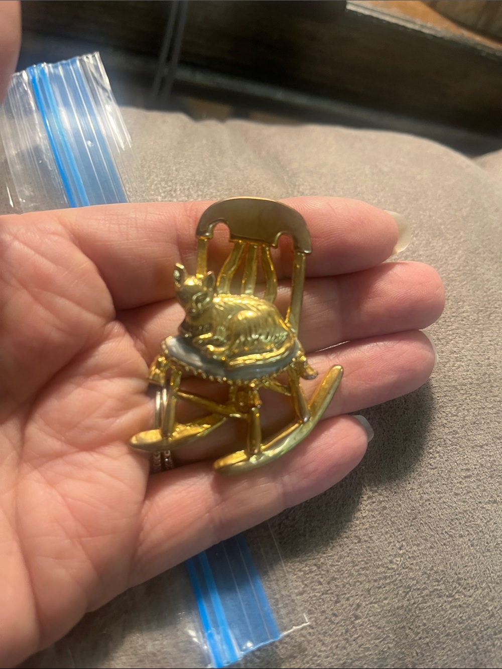 Cat in chair brooch. 1942